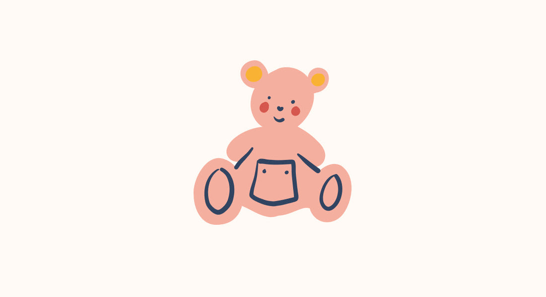 pink teddy bear with yellow ears