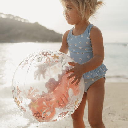 Child holding Little Dutch 3D Beach Ball in pink