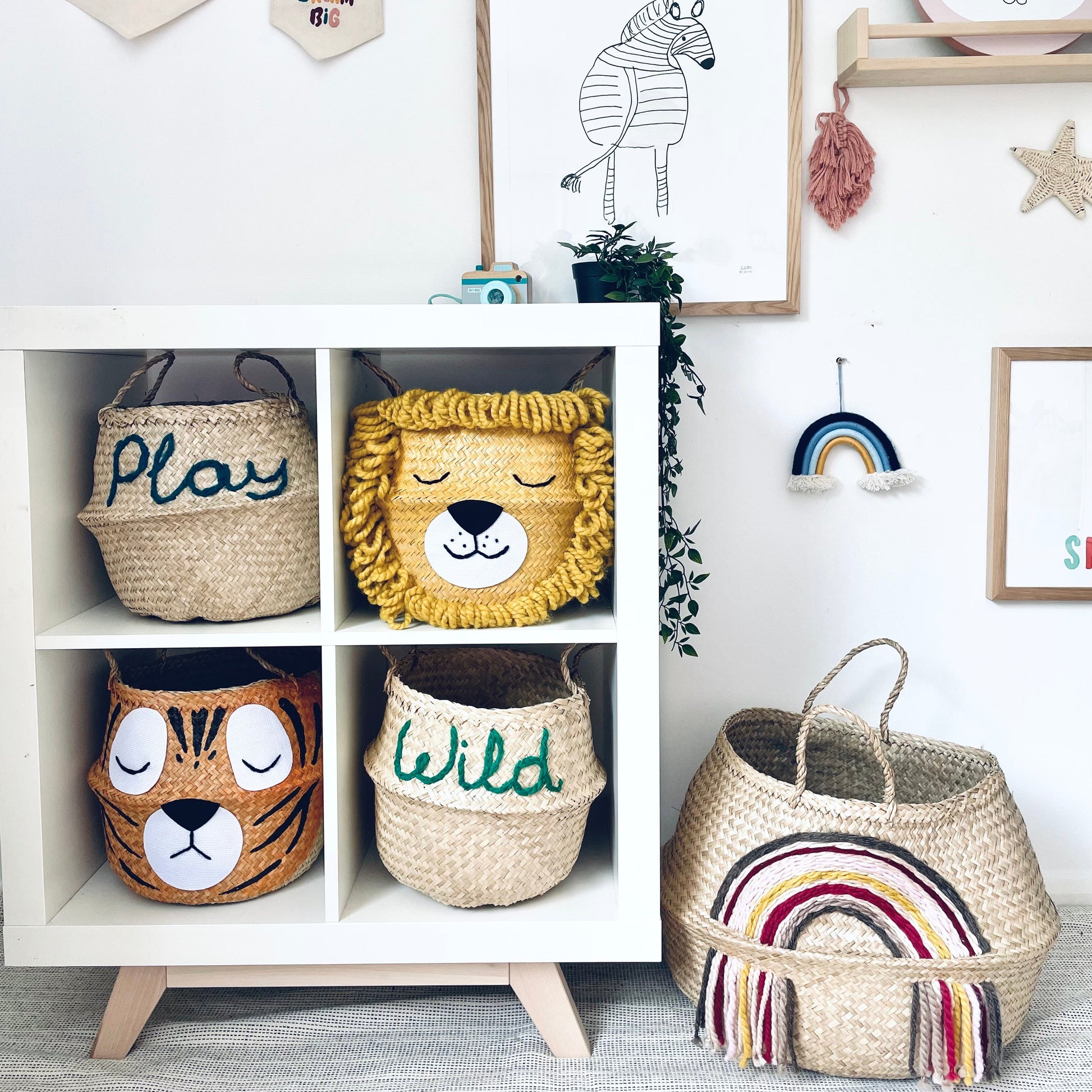Children's room with decorative baskets, wall art, and toys.
