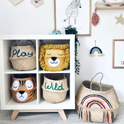 Children's room with decorative baskets, wall art, and toys.