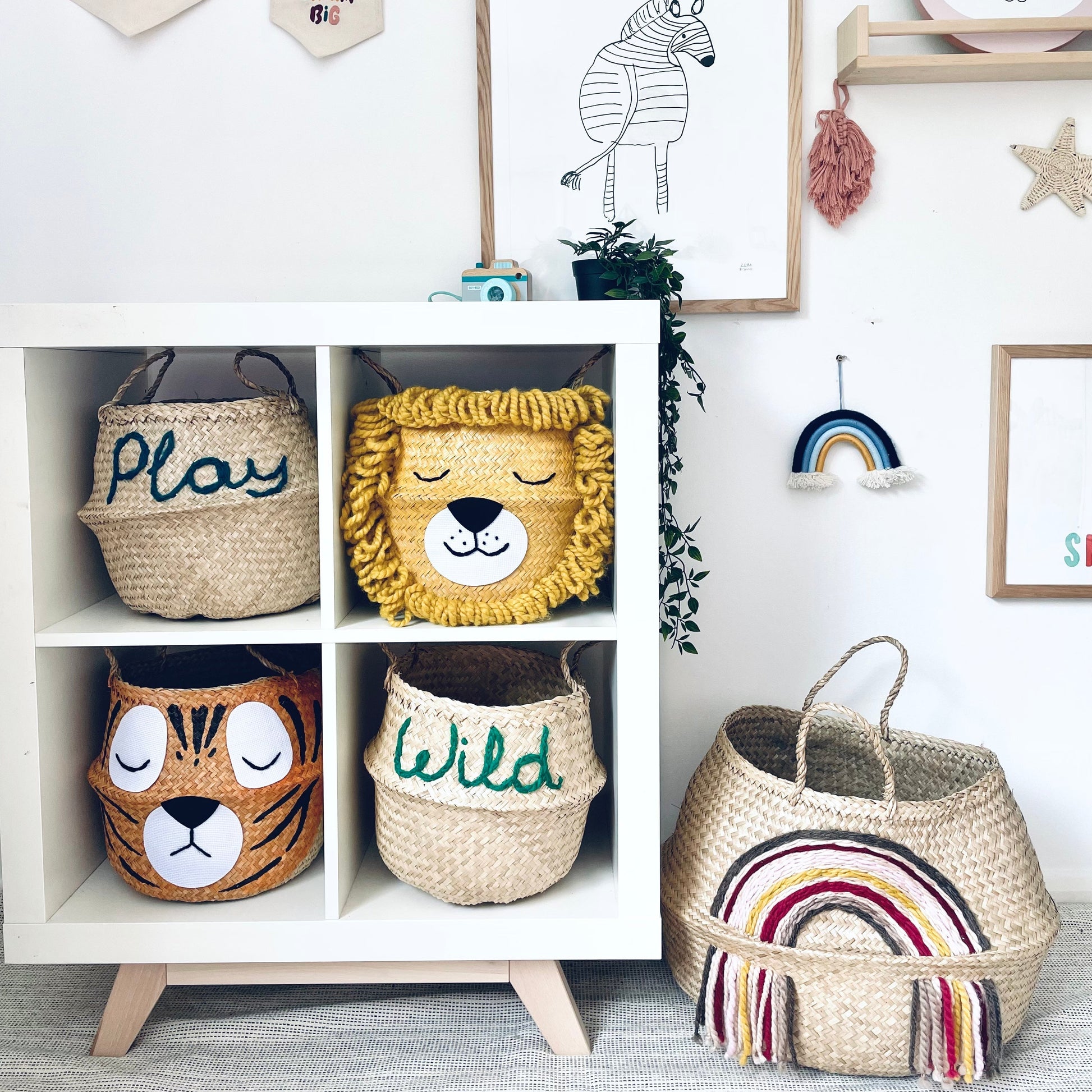 Children's room with decorative baskets, wall art, and toys.