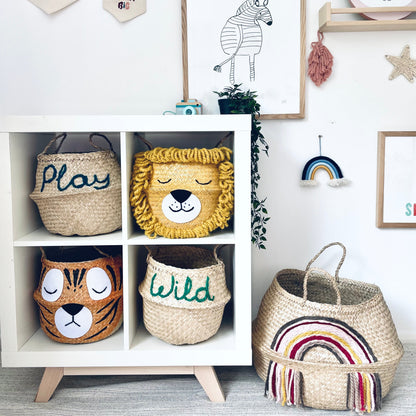Children's room with decorative baskets, wall art, and toys.
