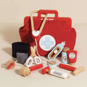 Le Toy Van Vintage Doctor Roleplay Wooden Kit with medical instruments and bottles inside a fabric Doctor’s Bag. 
