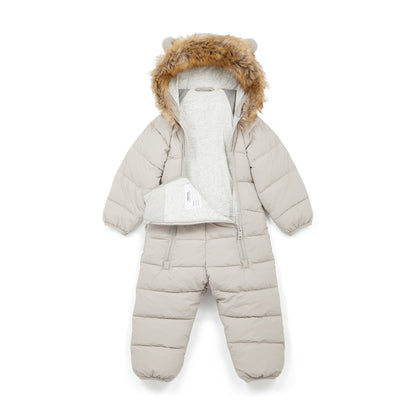 A baby snowsuit in white colour with a plush faux-fur trimmed hood, featuring ear details on the hood, a zippered front, and a soft light gray fleece lining, shown against a plain white background.