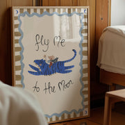 Decorative wall art with a tiger and child illustration and text 'Fly Me to the Moon' in a room setting.