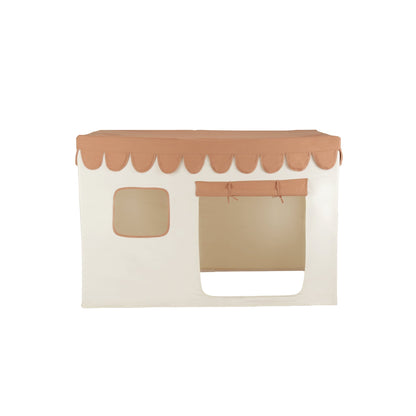 Children's playhouse with beige roof and white body on a white background