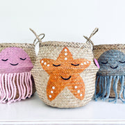 Three woven baskets shaped like a jellyfish, starfish, and octopus on a white background