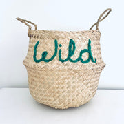 Woven basket with 'Wild' embroidered in green