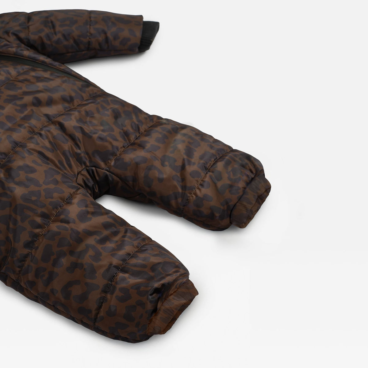 A close-up of a Finnson brown leopard-print puffer jacket laid flat on a white background.