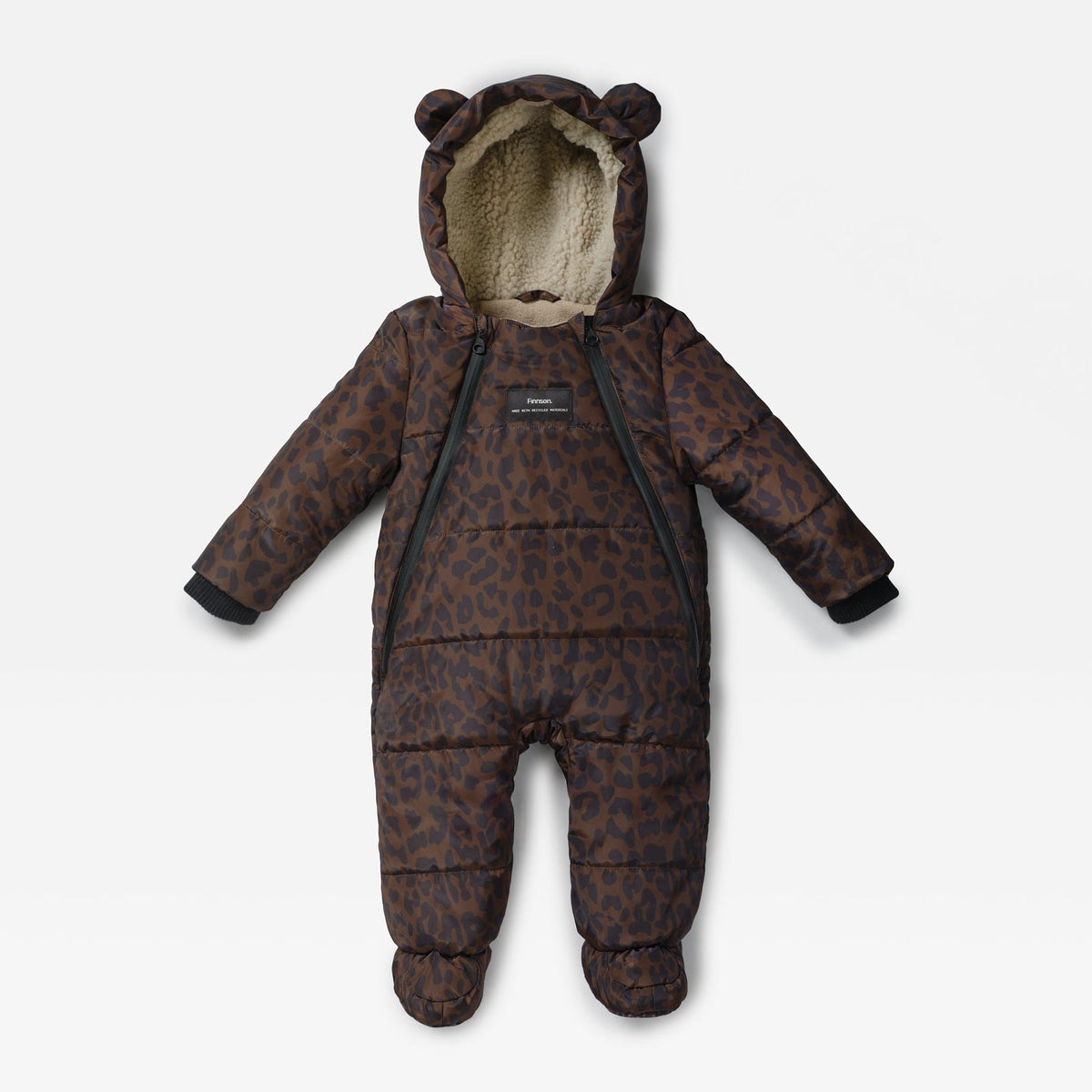 Finnson baby snowsuit in a brown and black leopard print pattern, featuring a plush beige fleece lining, a bear-ear hood, and a front zipper closure, shown against a light gray background.