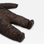 A close-up of the Finnson brown and black leopard-print puffer footed snowsuit, showing the quilted fabric texture and pattern on the legs and feet, set against a light gray background.