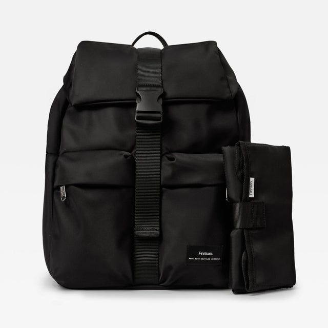 Finnson Black changing backpack with a  black travel changing mat on a white background