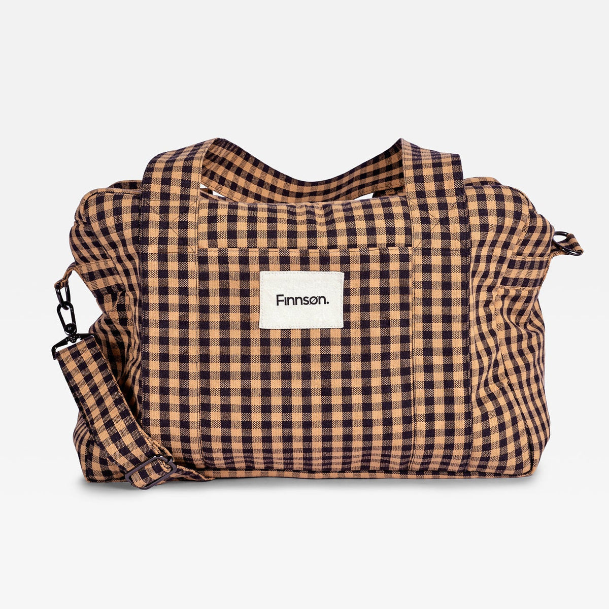 A brown and beige gingham check duffel bag with a white front label reading 'Finnson', shown on a light gray background.