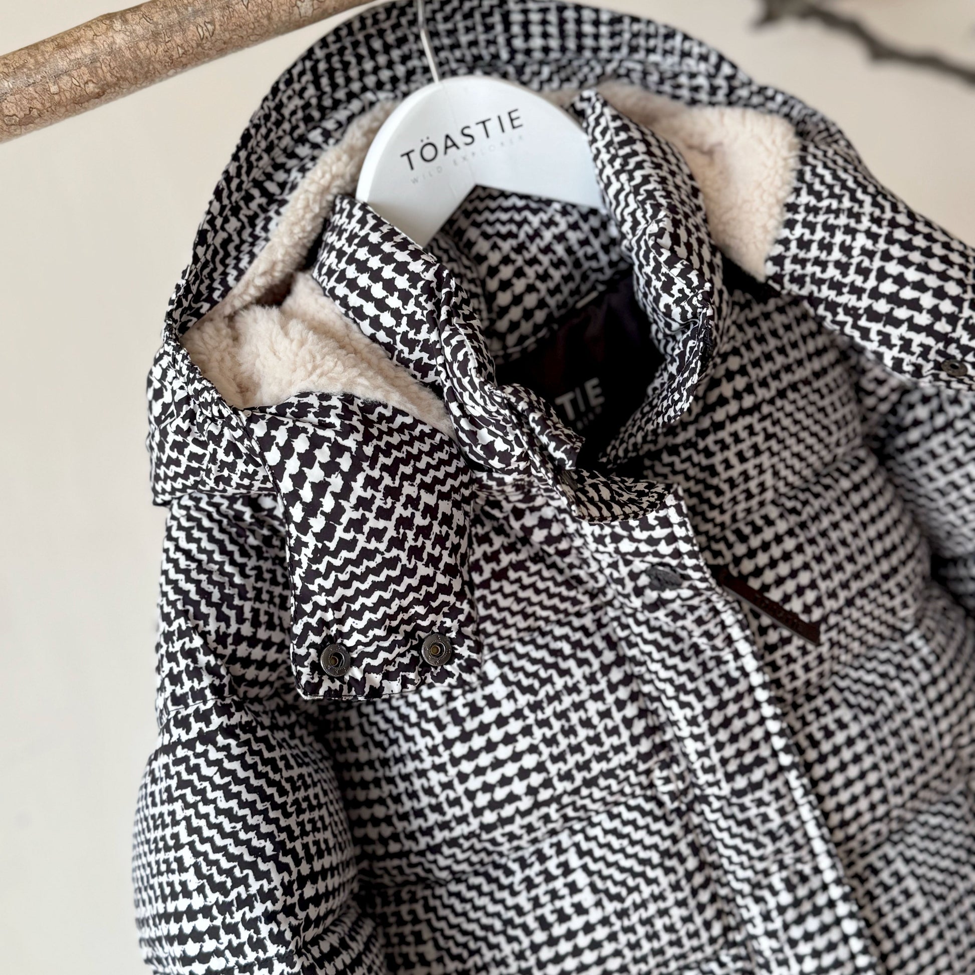 Black and white houndstooth puffer jacket