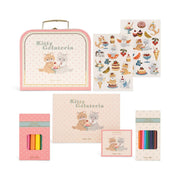 Collection of 'Kitty Gelateria' themed stationery items including a lunchbox, stickers, and color pencils on a white background.