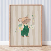 Framed illustration of a mouse in overalls wearing a backpack and holding  a map against a striped background.