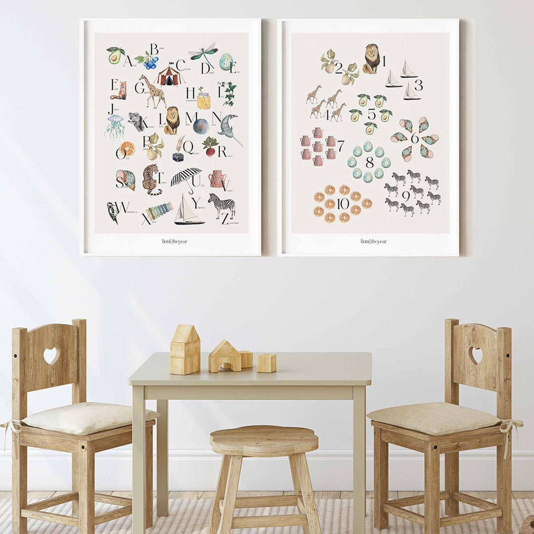 Children's table and chairs set with educational posters on a wall