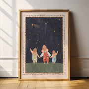 Framed artwork of three mice holding hands under a starry sky on a wall.