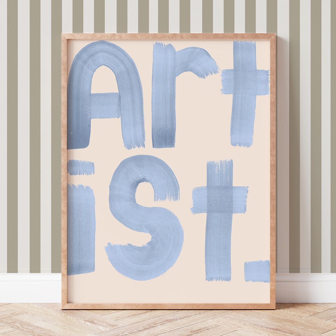 Framed artwork with 'ARTIST' in blue on a striped wall background