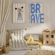 Children's playroom with seating, toys, and wall art including a bear illustration and the word 'BRAVE'.
