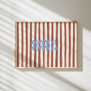 Striped art print with 'Comme ci, comme ca' text on a light background