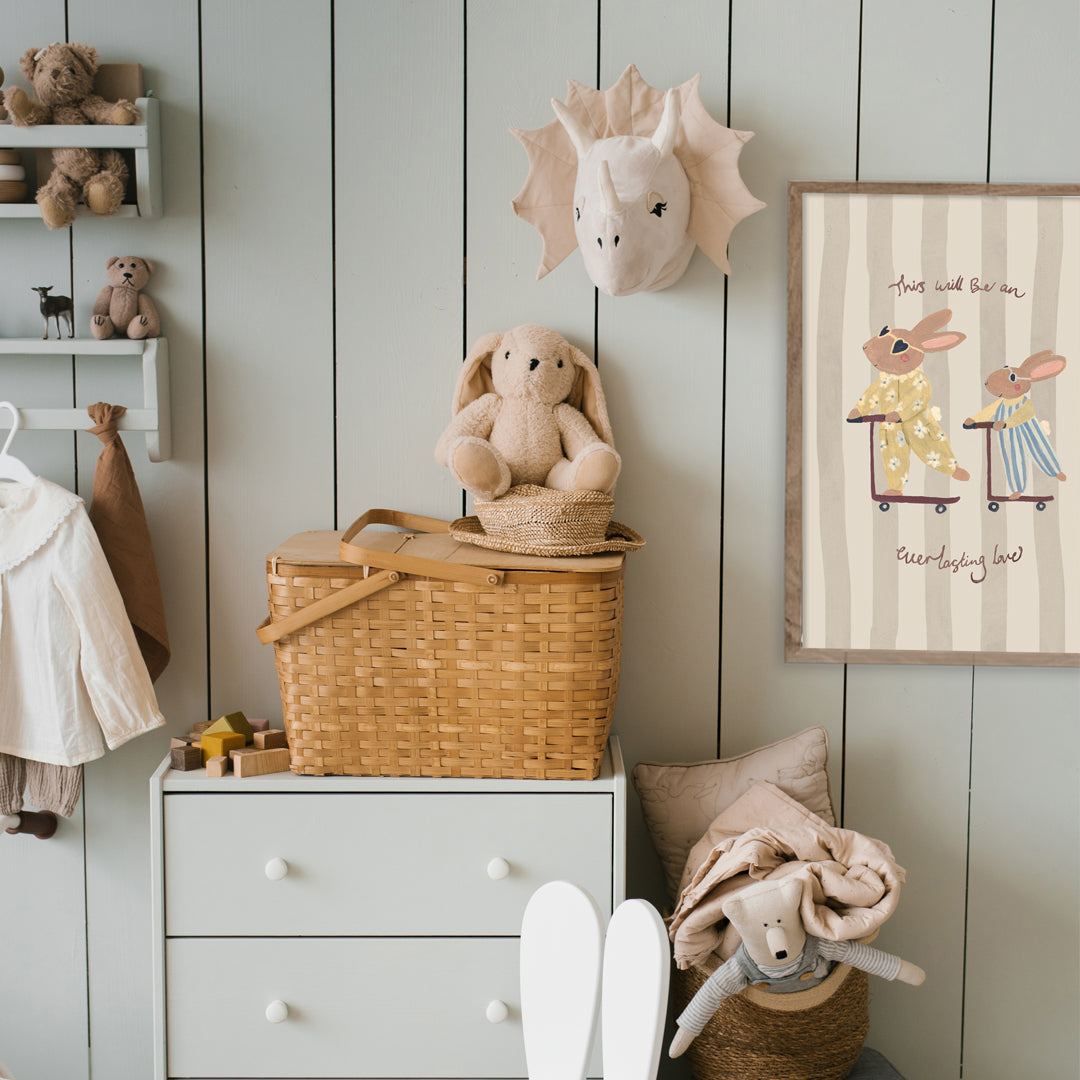 Children's room with a dresser, chair, and toys against a wooden paneled wall.