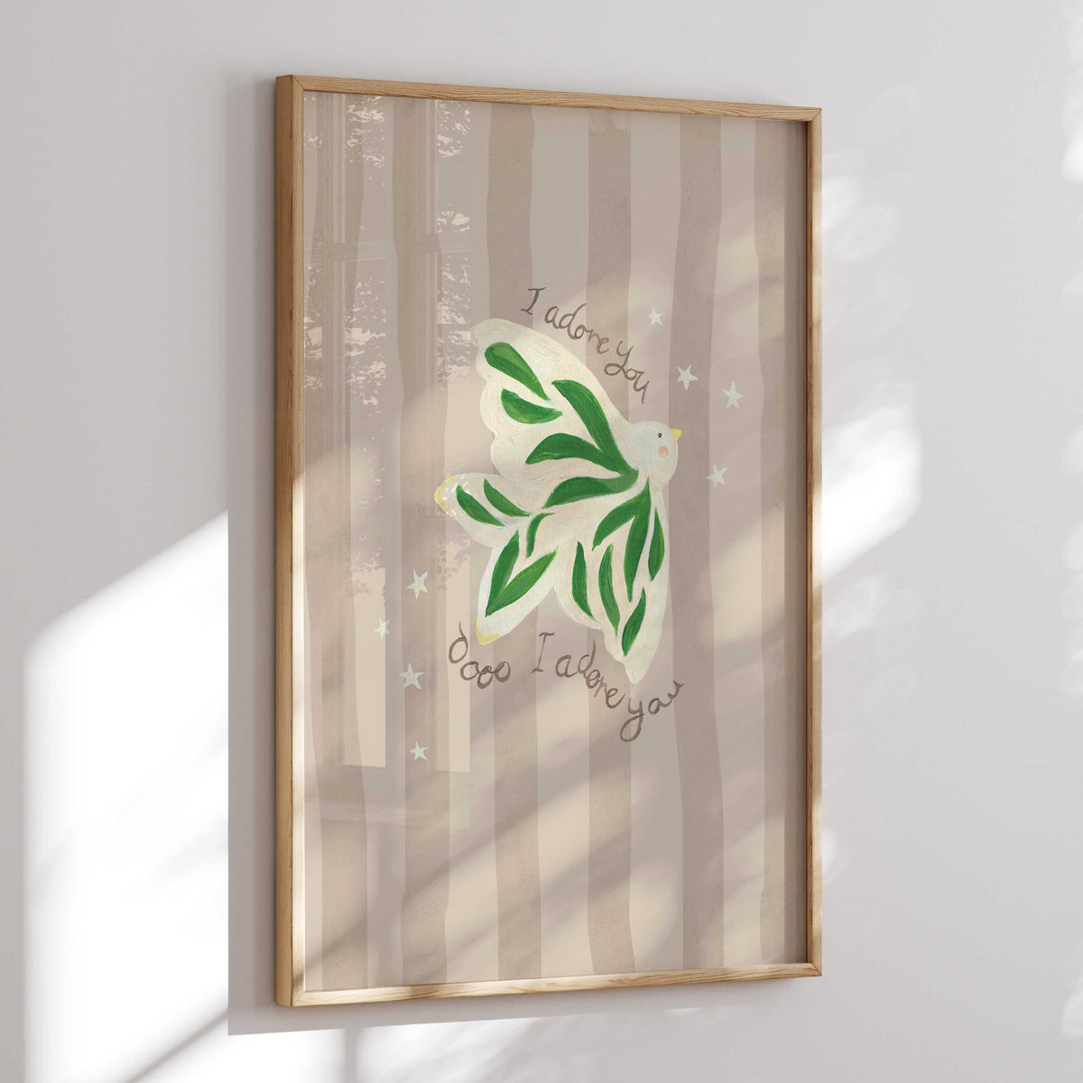 Framed artwork with green dove design and text  'I adore you oooo I adore you' on a striped background