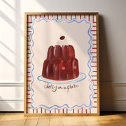 Framed artwork of a red jelly on a white background with decorative border.