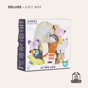 Le Toy Van Andes Stacking Animals, a 9-piece wooden toy set featuring an alpaca, sloth, flamingo, lizard, toucan, butterfly, fox, leopard, and capybara, packaged in a cotton drawstring bag, designed for children 18 months and older, and promoted as a deluxe gift box. 