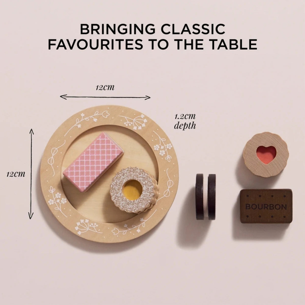 A wooden toy serving tray set with printed floral details, shown with miniature food pieces on top. The image includes dimension labels indicating 12cm width and 12cm depth, plus text reading 'BRINGING CLASSIC FAVOURITES TO THE TABLE.