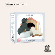 Le Toy Van's Pet Set for dollhouses, featuring a wooden dog, cat, kennel, and accessories, promotes imaginative play for children ages 2 and up. 
