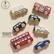 Le Toy Van London Car Set: a collection of 7 iconic wooden vehicles, including a double decker bus, taxi, fire engine, police van, ambulance, and two sporty cars, hand painted with non-toxic dyes, perfect for creative play. 