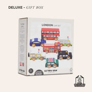 Le Toy Van London Car Set 7 Piece for children aged 3 and up, including a double decker bus, taxi, fire engine, police van, ambulance, and two sporty cars, all made of durable wood and painted with non-toxic, water-based dyes. 