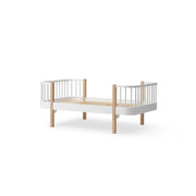 Oliver Furniture Wood Original Junior Bed in white and oak features Scandinavian design with curved corners, convertible to full-size bed, suitable for children transitioning to their own bed.