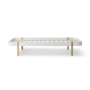 Oliver Furniture Wood Lounger 120cm in white and oak, a Scandinavian-designed bed frame suitable for children, teenagers, and adults, offering comfort and style. 