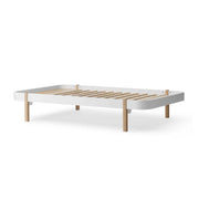 Oliver Furniture Wood Lounger 120cm in white and oak, showcasing Scandinavian design ideal for kids, teens, and adults, with a wider frame for extra comfort during growth spurts, mattress not included. 