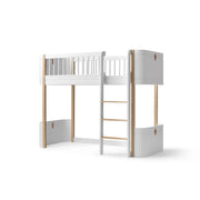 Oliver Furniture Wood Mini+ Low Loft Bed in white and natural oak with right-side ladder, curved safety rails, and open play space underneath for children ages 6+.