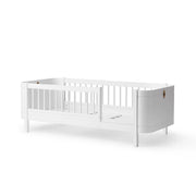 Oliver Furniture Wood Mini+ Junior Bed in white, designed for small children's bedrooms and featuring a safe, cosy space with optional bed guard. 