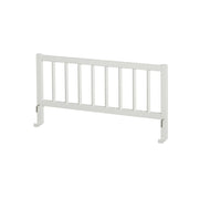 White Oliver Furniture Seaside Classic day bed with Nordic design, featuring vertical slats and sturdy wooden frame, ideal for children's bedrooms, guest rooms, or living spaces.