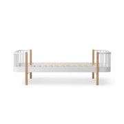Oliver Furniture Wood Original Bed in white and oak features Scandinavian design with curved corners, slatted base, and sturdy wooden legs, suitable for older children and teenagers.