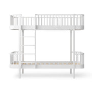 White wooden Oliver Furniture bunk bed with curved safety railings, left-side ladder, and convertible design for siblings.