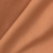 Close-up of the Oliver Furniture Wood Original Bunk Bed/Low Loft Bed Curtain in a warm terracotta color, made of soft cotton with a visible woven texture, designed to create a cozy and stylish hideout for kids. 