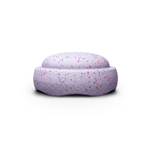 Stapelstein Stepping Stone in a light lavender violet with a multicolor speckled pattern of red and purple flecks, shown against a plain white background.