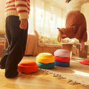 Children playing with the Stapelstein Stepping Stones 6 + 1 Set Winter Special