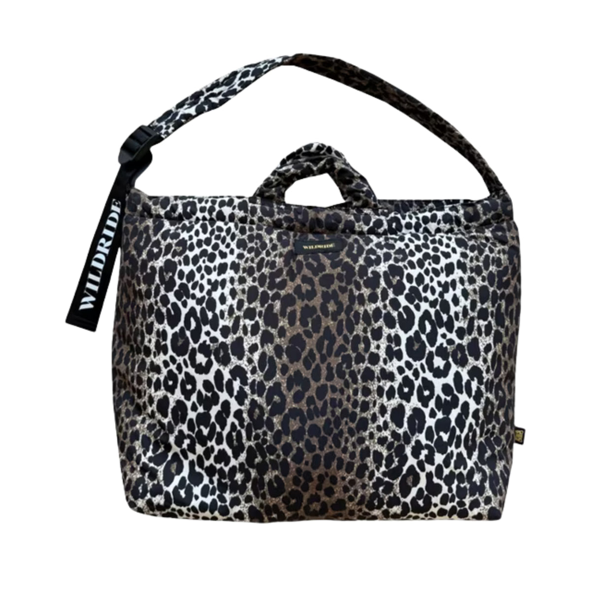 A leopard print tote bag with black handles and a black shoulder strap, featuring a black hanging tag with the brand name 'WILDRIDE'.