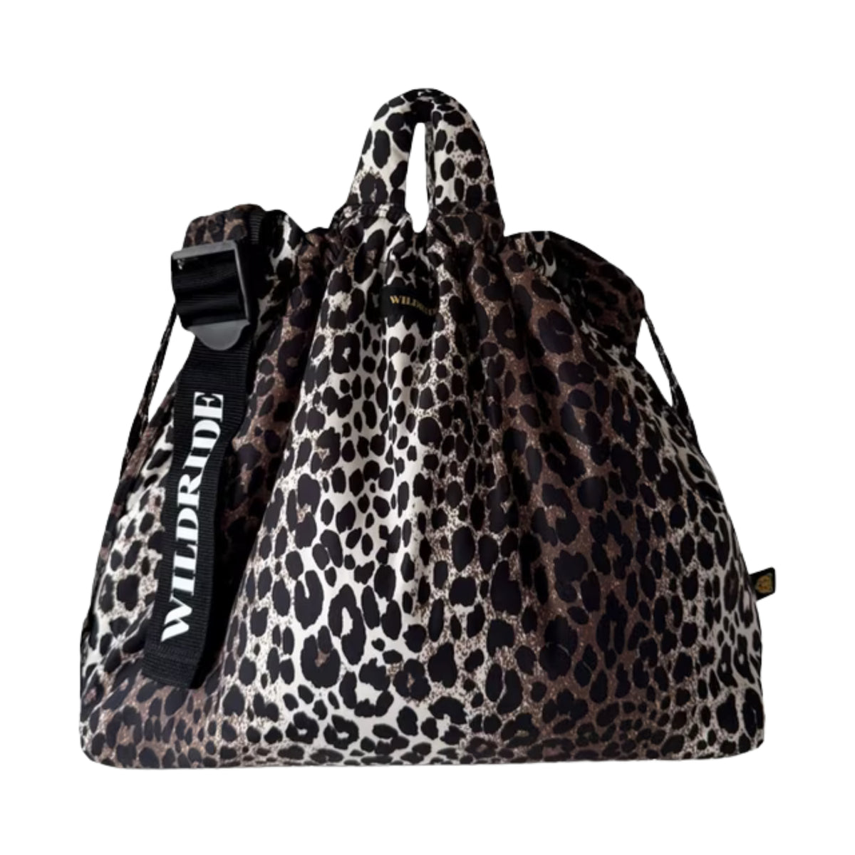 A leopard print drawstring bag with a black adjustable shoulder strap featuring the brand name 'WILDRIDE' in white text, shown against a plain white background.