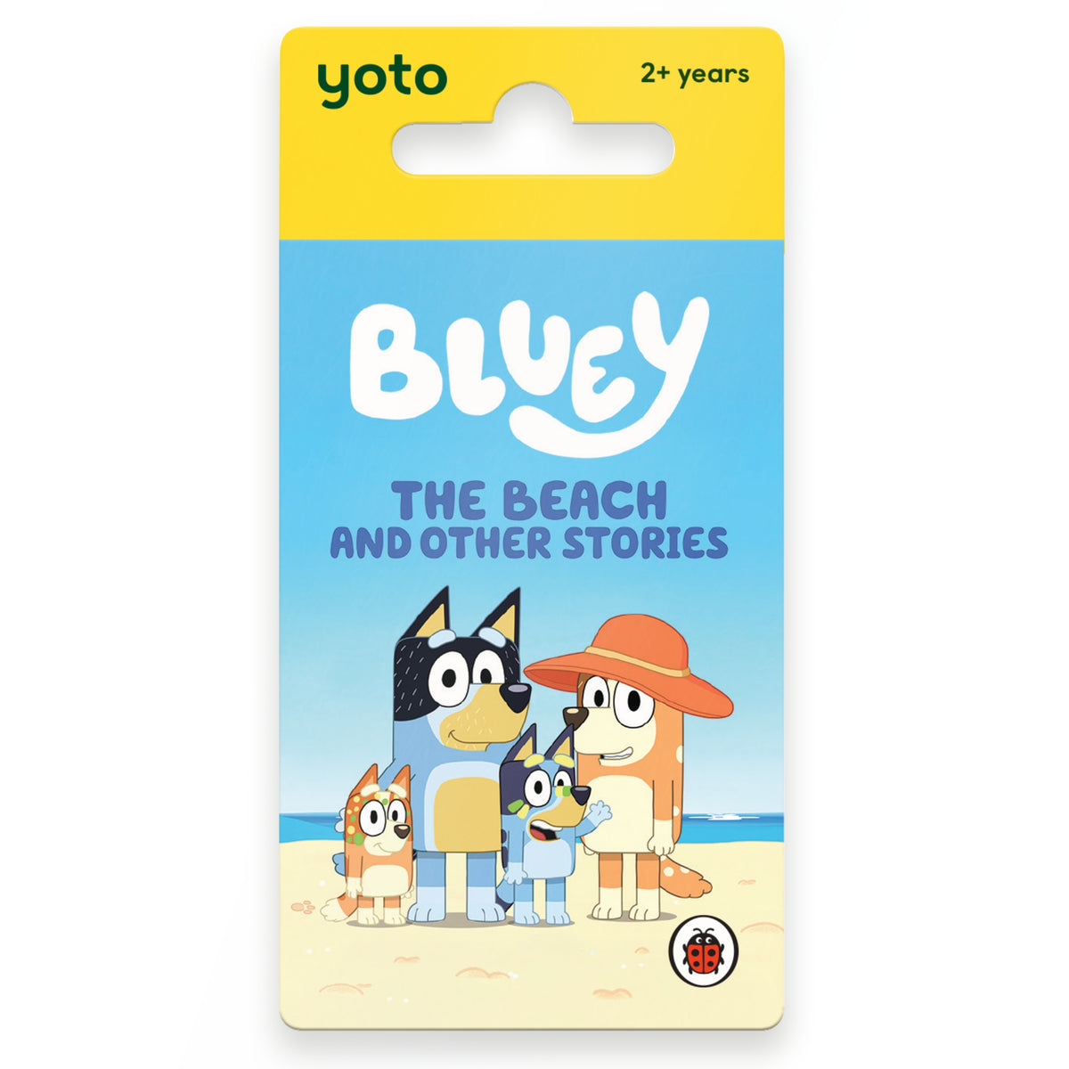 Yoto Bluey The Beach and Other Stories card book in its original yellow and blue hanging card packaging, featuring the Bluey characters on a sandy beach.