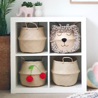 Children's room with storage baskets, toys, and decorative items on shelves.