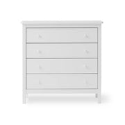White Oliver Furniture Seaside 4 Drawer Dresser with soft-close drawers and porcelain handles, featuring Scandinavian design and engineered birch wood construction for bedroom and nursery storage.