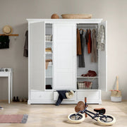 White Oliver Furniture Seaside triple wardrobe with soft-close doors, adjustable shelving, full and half-height hanging rails, and three drawers, ideal for organizing children's clothing and bedroom storage.